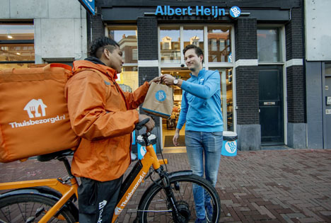 Lieferduo AH to go und Thuisbezorgd.nl beginnen Partnerschaft in Amsterdam